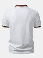 Polo homme texturé à col zippé contrasté